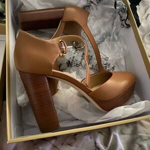 Michael kors heels. Size 6.5. worn twice; smoke free home.
